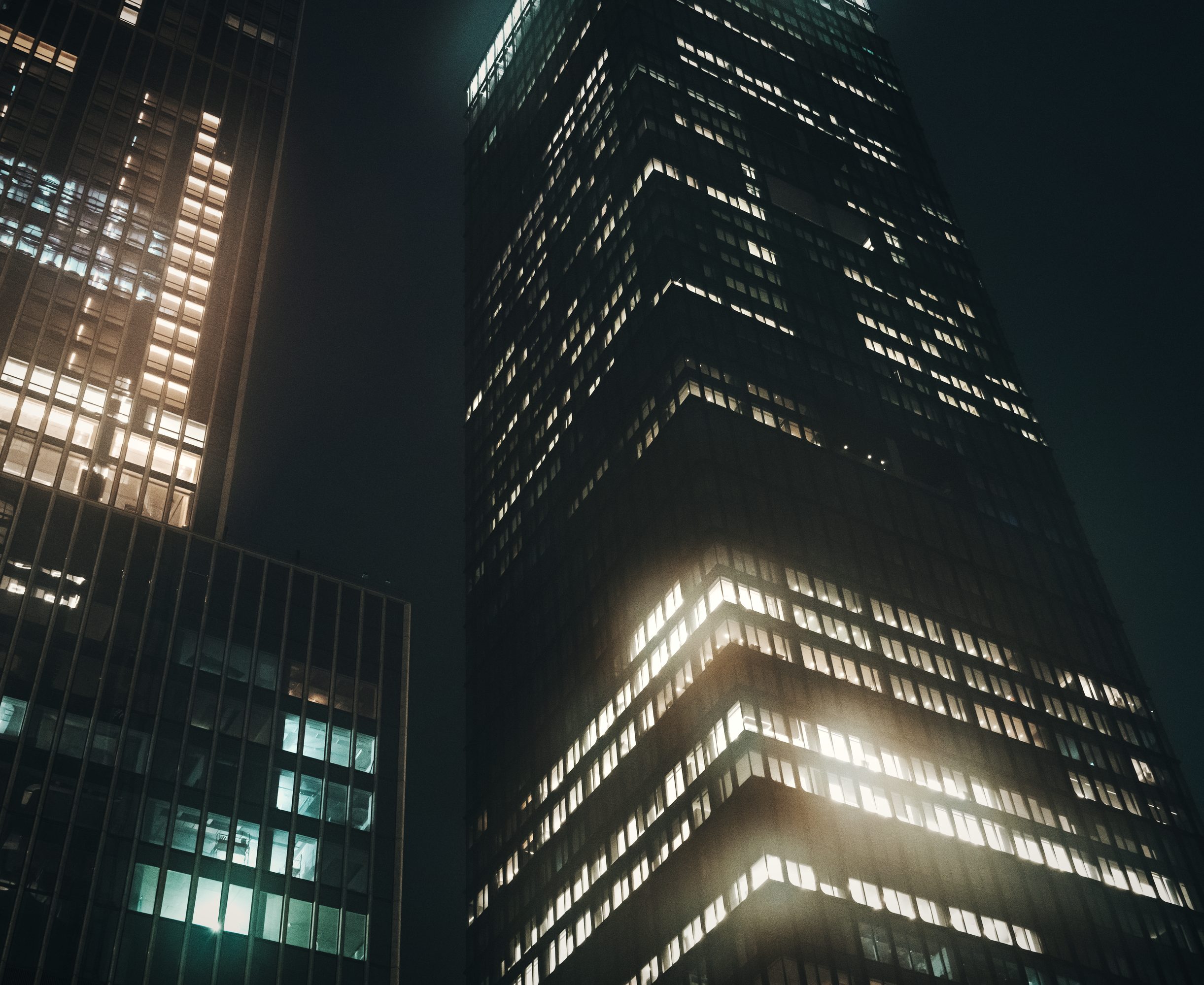 City towers lit at night