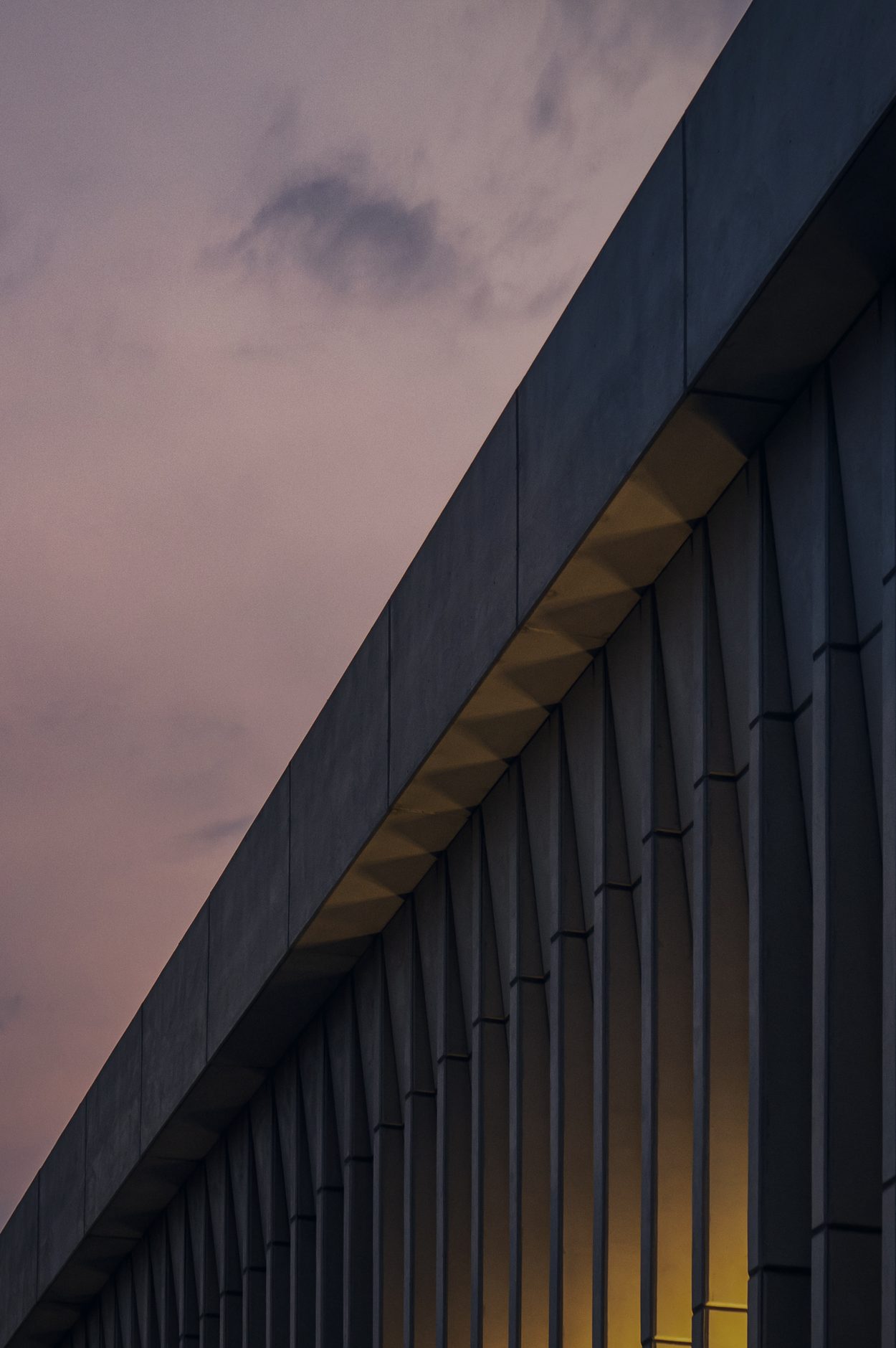 Geometric building at sunset
