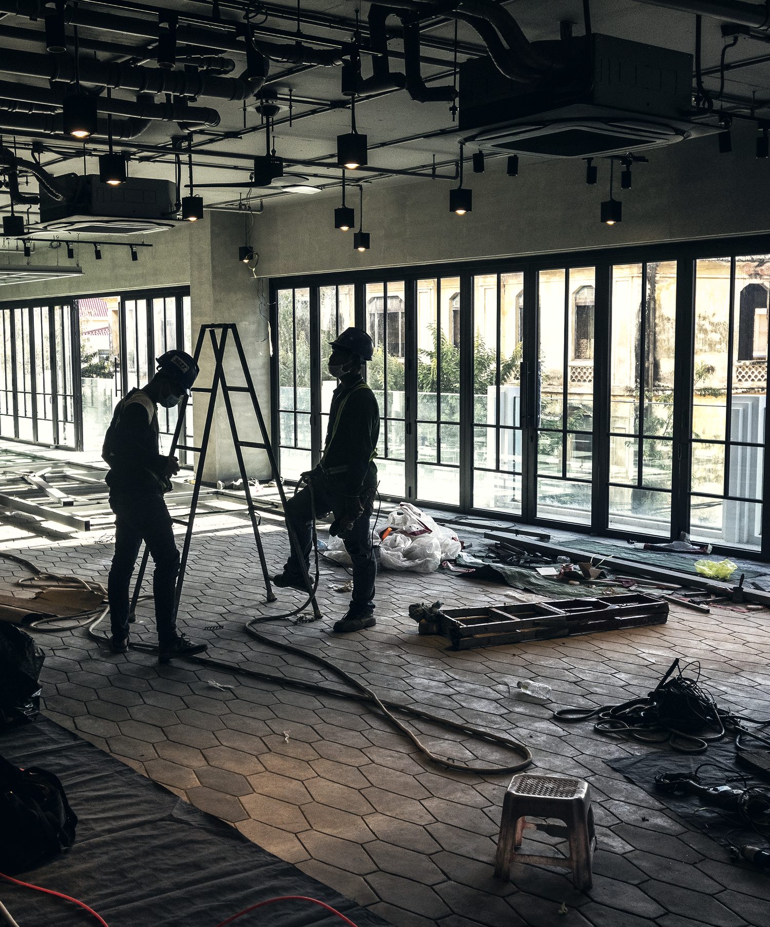 Crew fitting out an open-plan interior