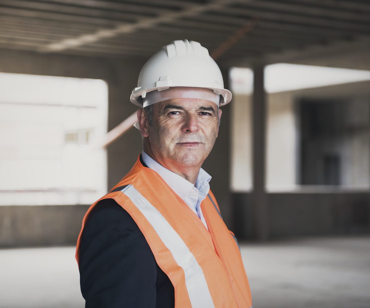Luc Tremblay in a hard hat on site